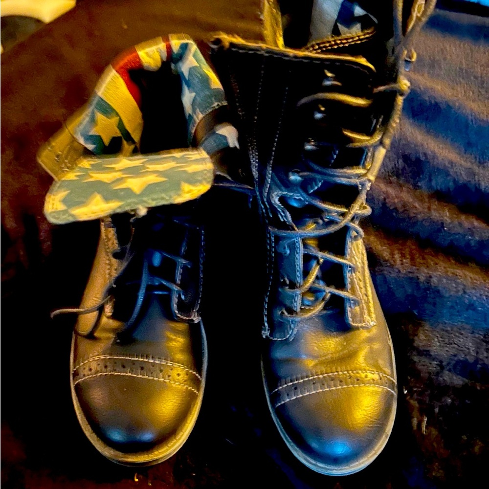 Women’s black boots with American flag liner
